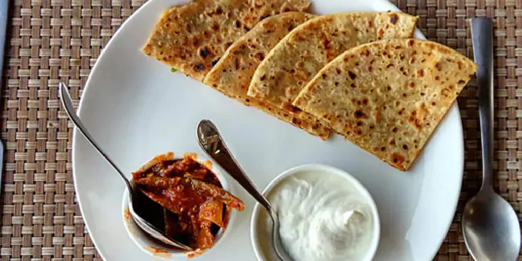 Paneer paratha with curd